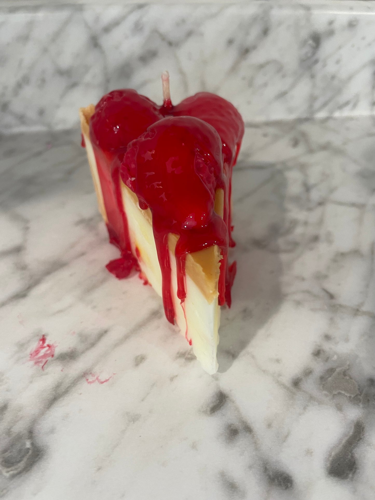 Slice of strawberry cheesecake