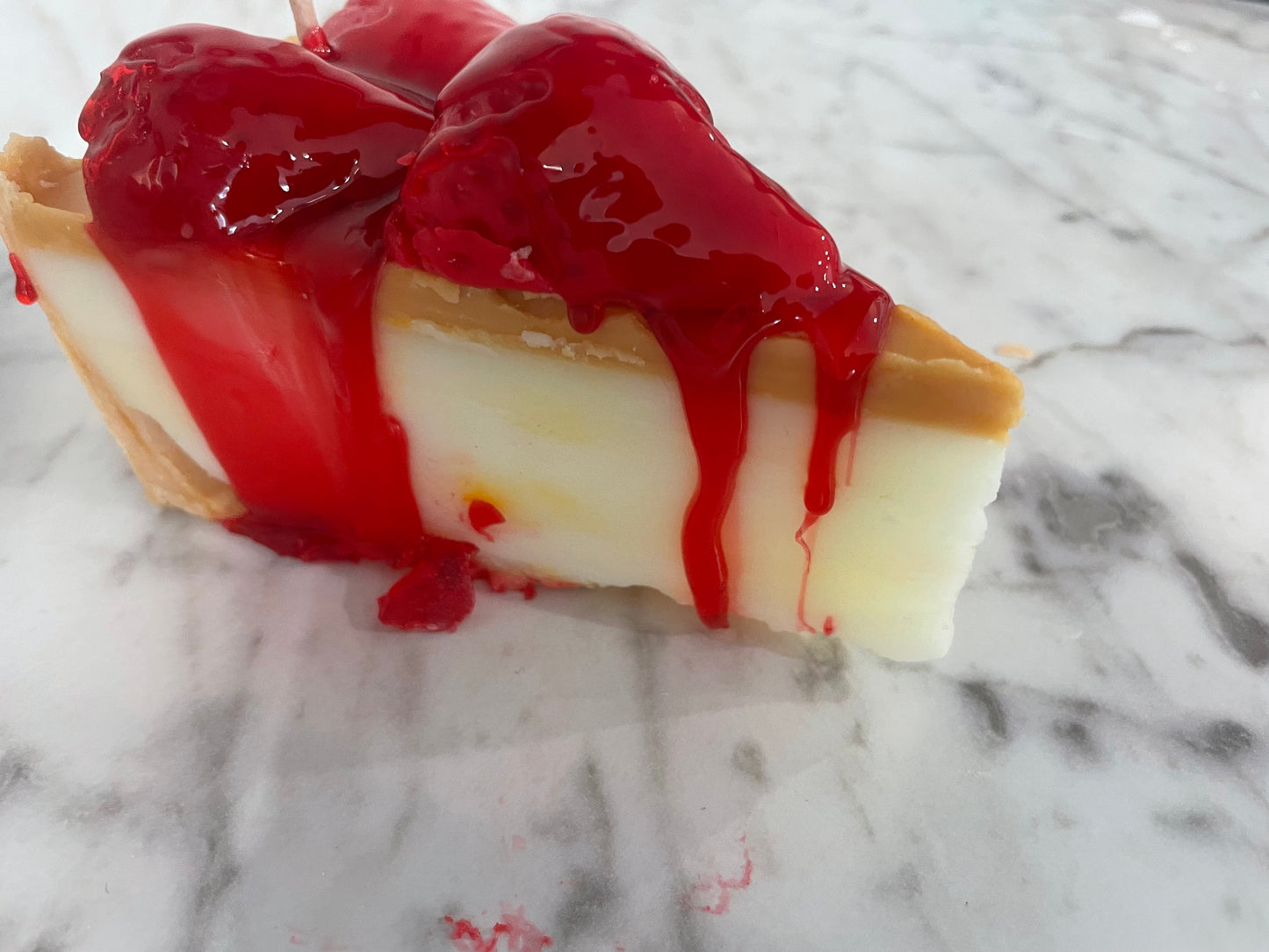 Slice of strawberry cheesecake