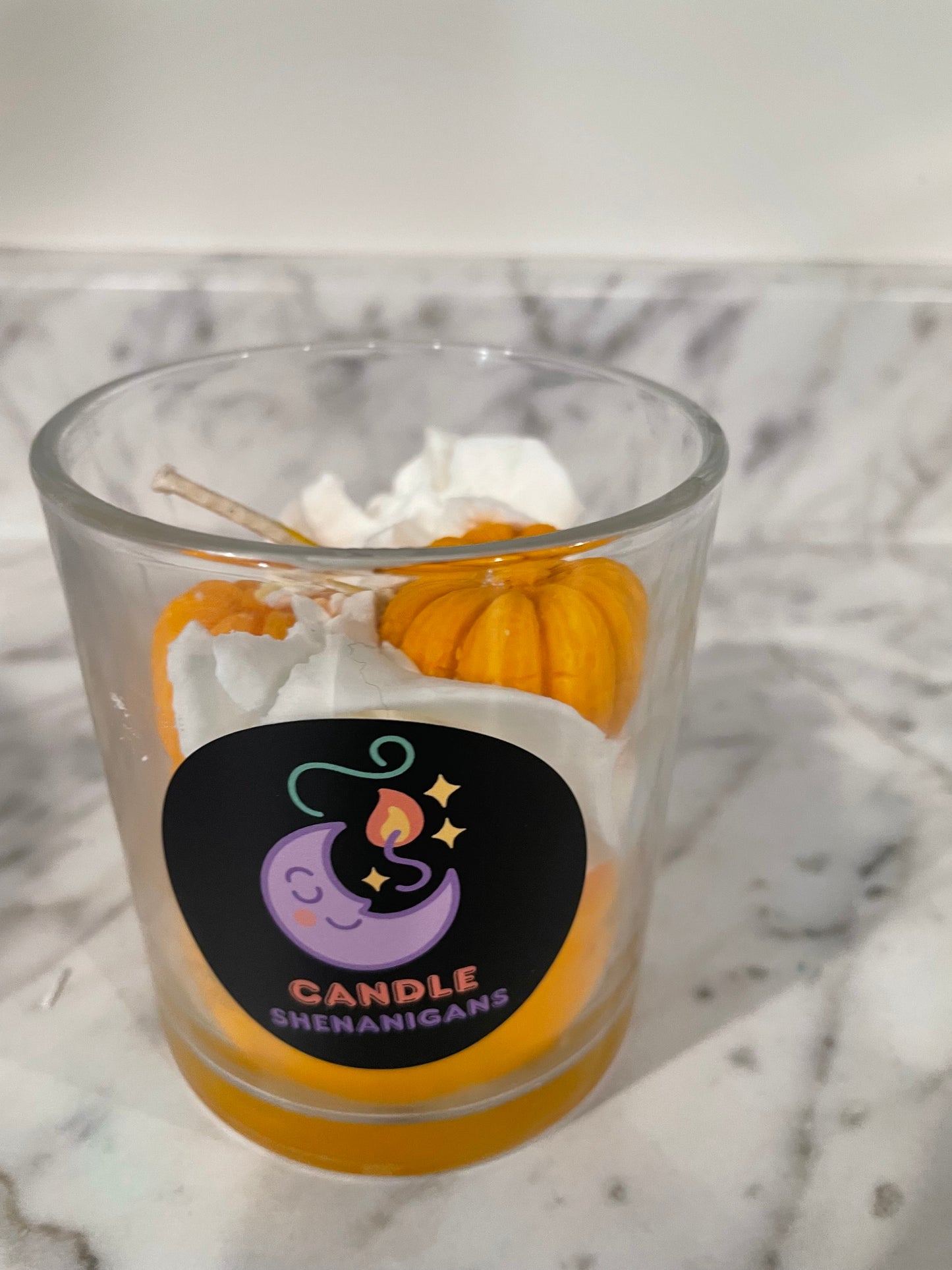 Fall candles with pumpkins and ghosts
